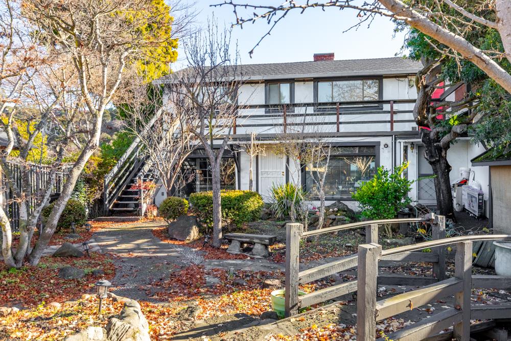 3010 North Main Street Soquel, CA 95073 - Photo 1 of 32 a front view of a house with plants