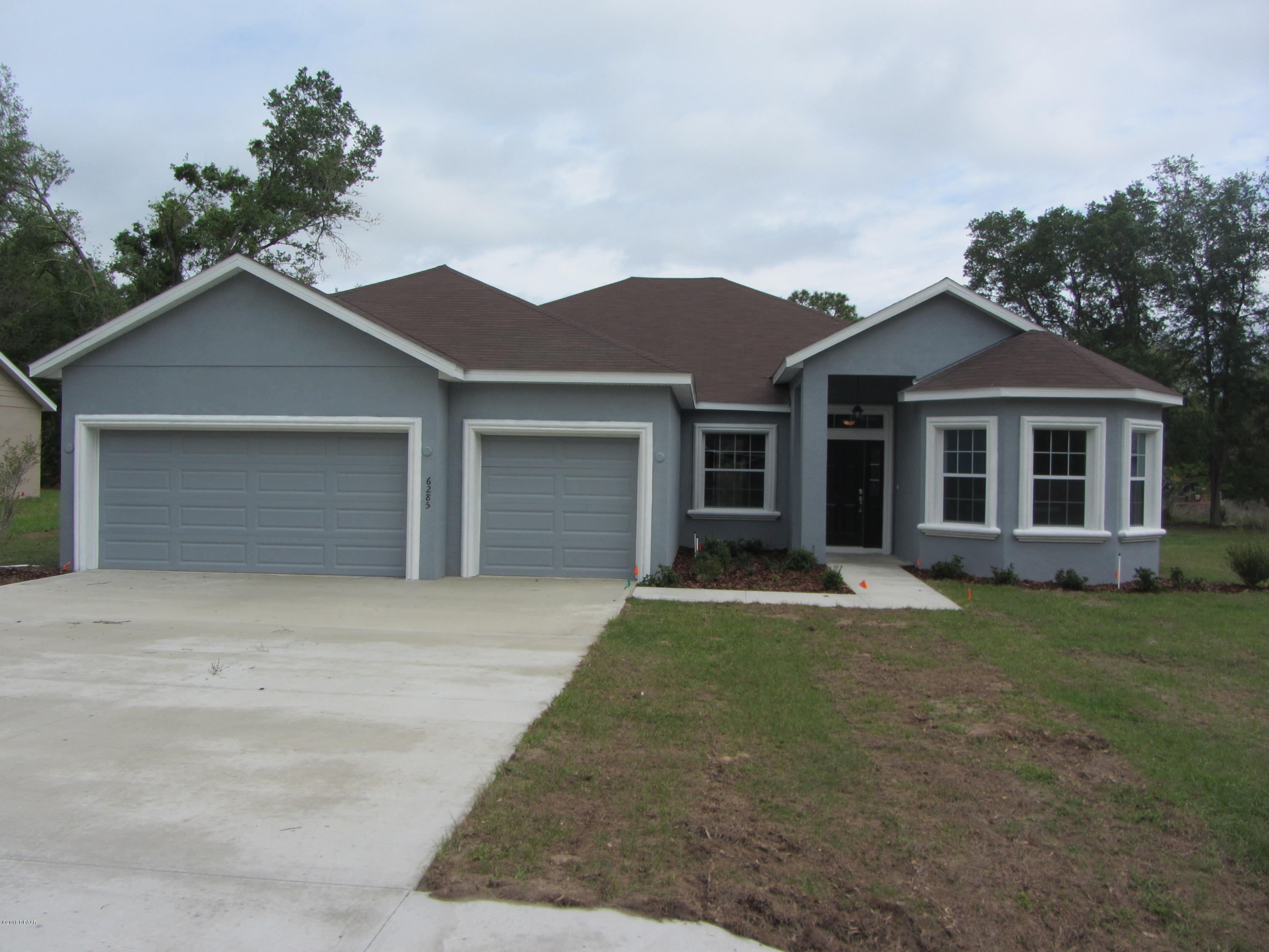 6285 Southwest 116th St Road Ocala, FL 34476 - Photo 1 of 27 IMG_3463