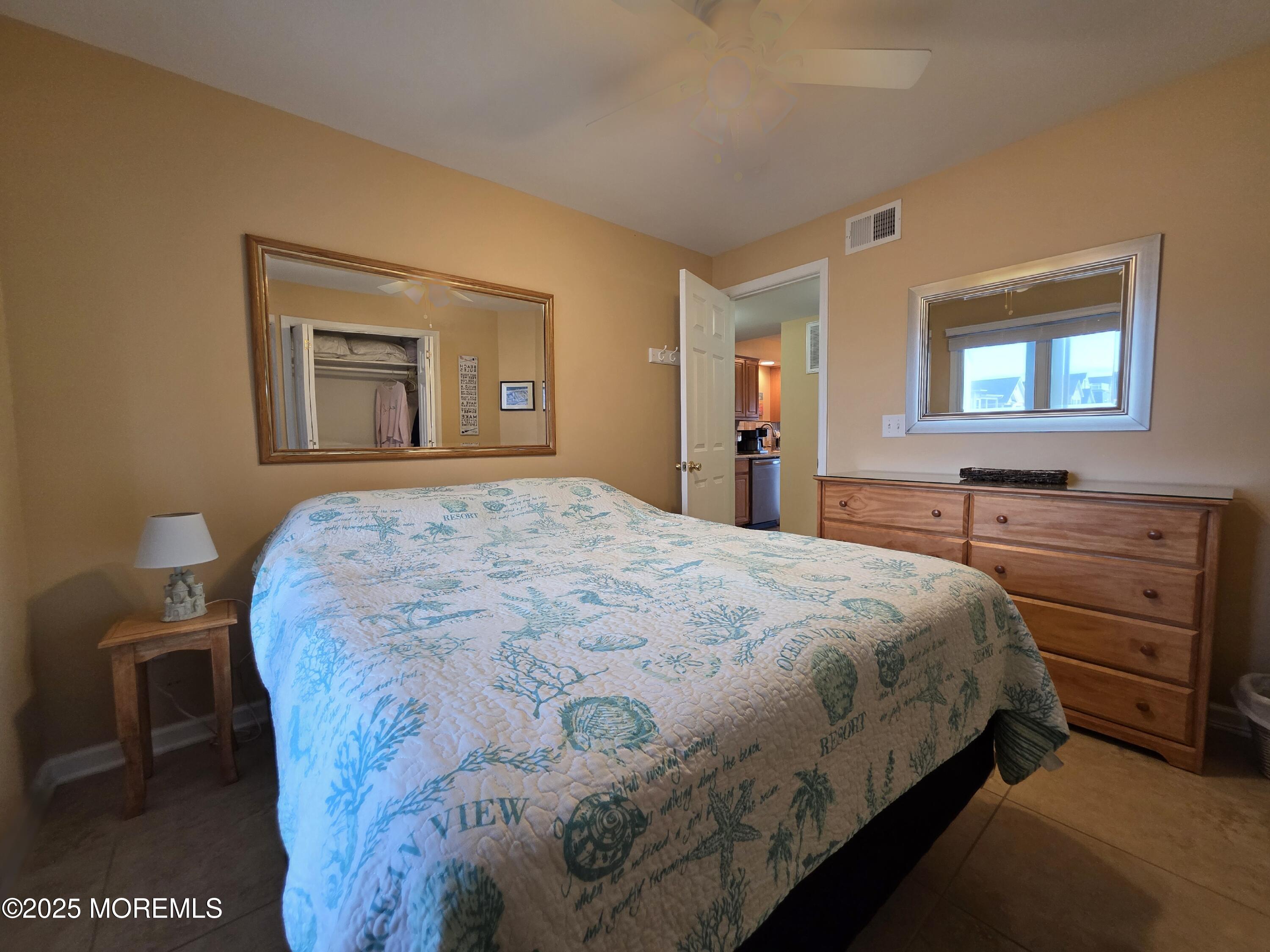 37 Dune Terrace Seaside Heights, NJ 08751 - Photo 12 of 16 a bedroom with a bed and a dresser