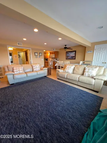 a living room with furniture and a couch