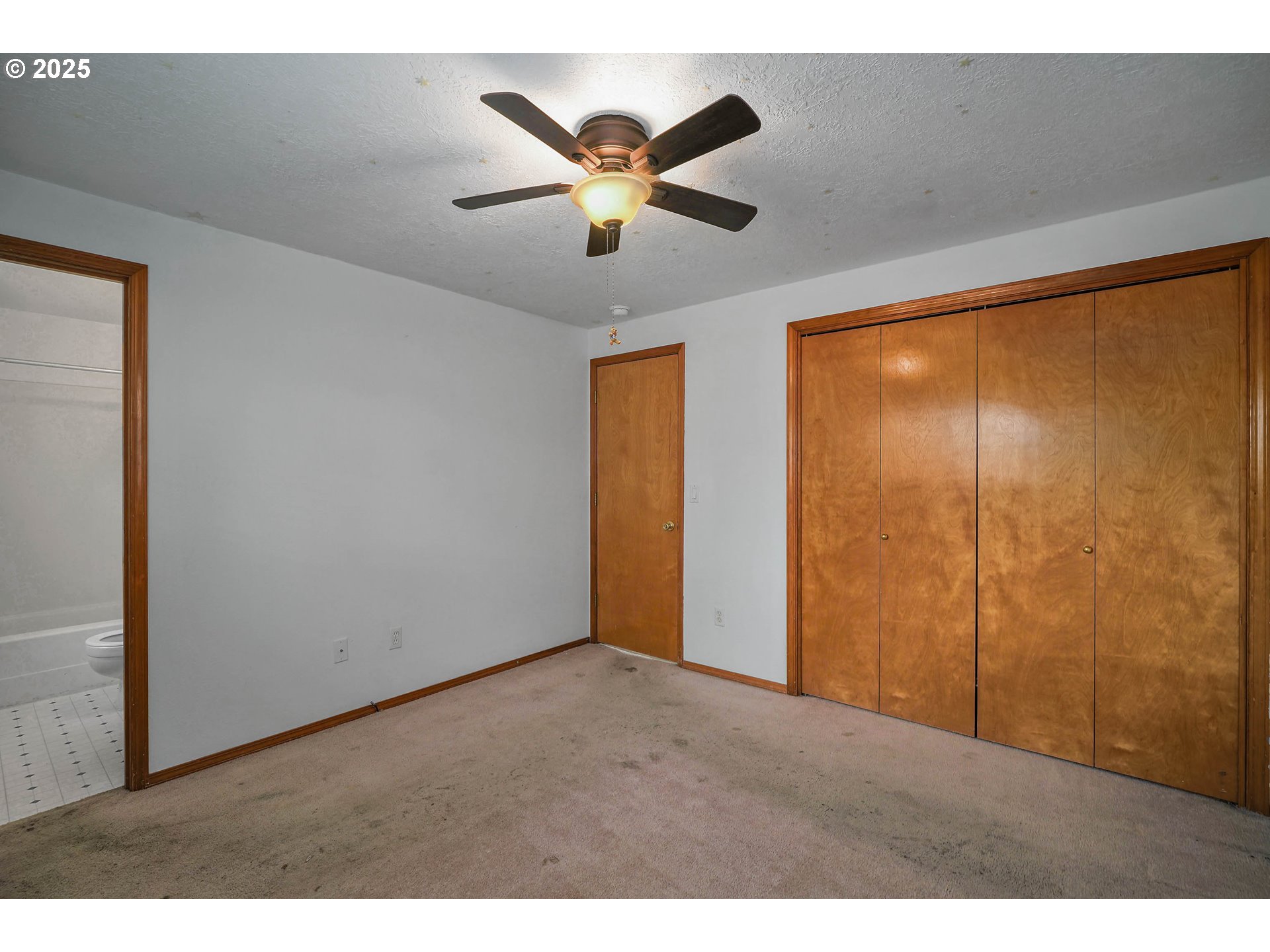 5259 Spring Leaf Court North Keizer, OR 97303 - Photo 22 of 30 a view of an empty room with a ceiling fan