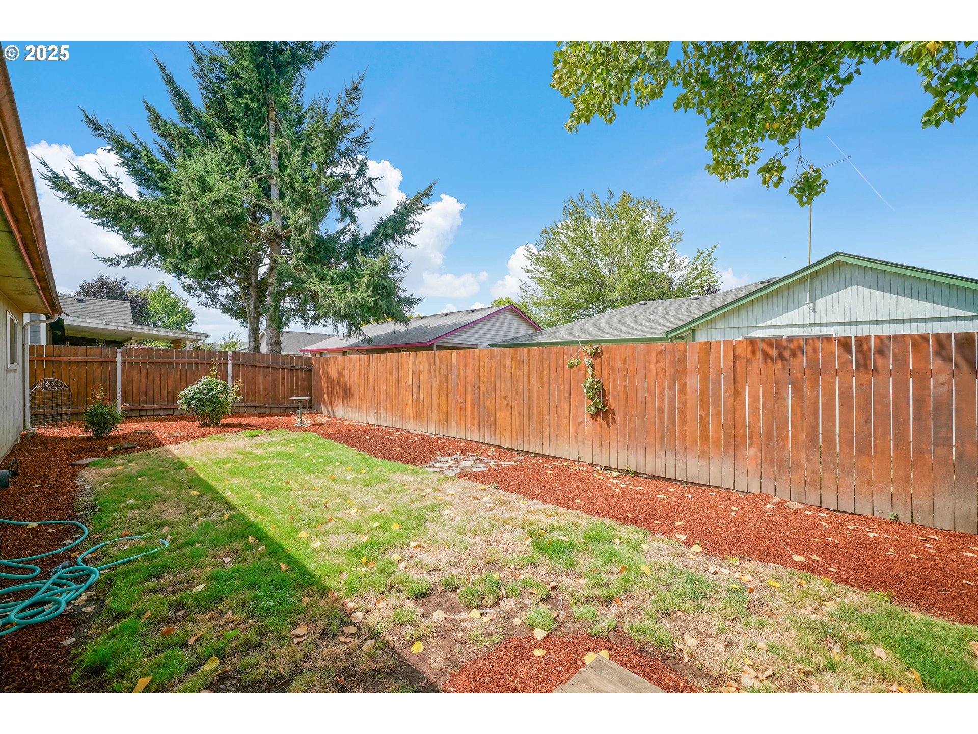 5259 Spring Leaf Court North Keizer, OR 97303 - Photo 26 of 30 a backyard of a house with lots of green space