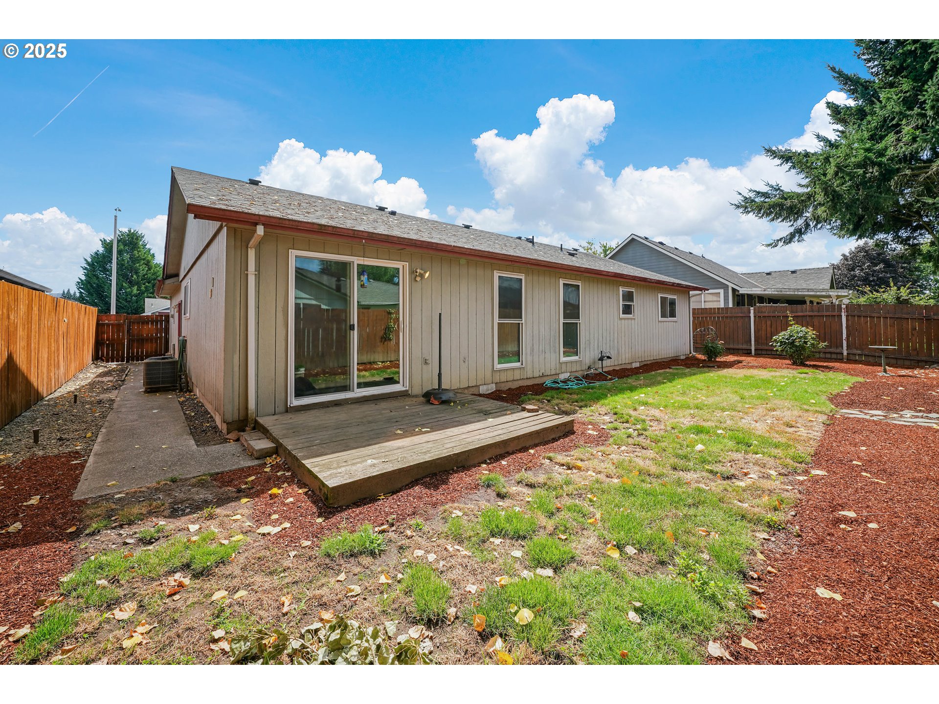 5259 Spring Leaf Court North Keizer, OR 97303 - Photo 28 of 30 a front view of a house with a yard and potted plants
