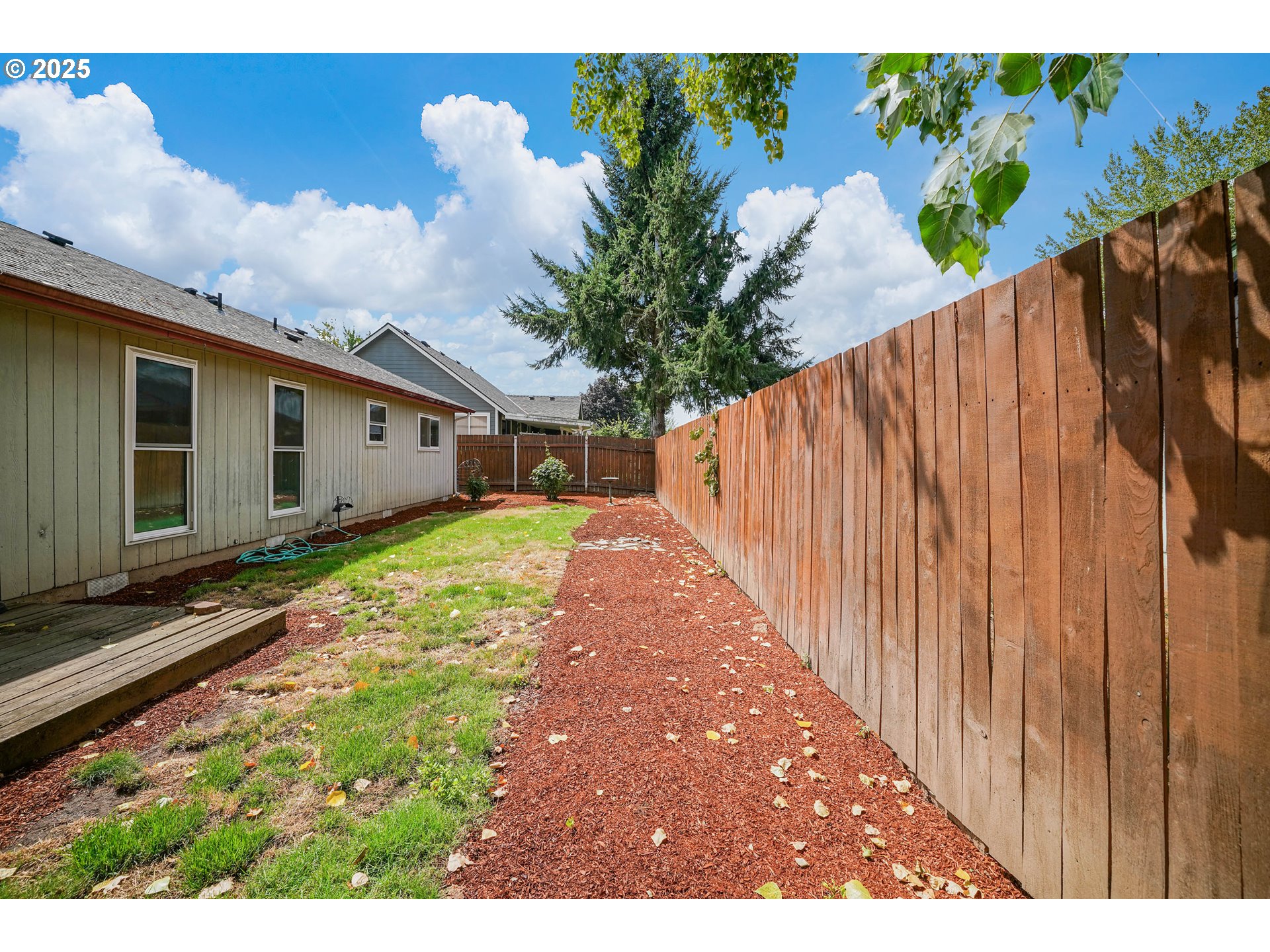 5259 Spring Leaf Court North Keizer, OR 97303 - Photo 29 of 30 a view of a backyard with pathway