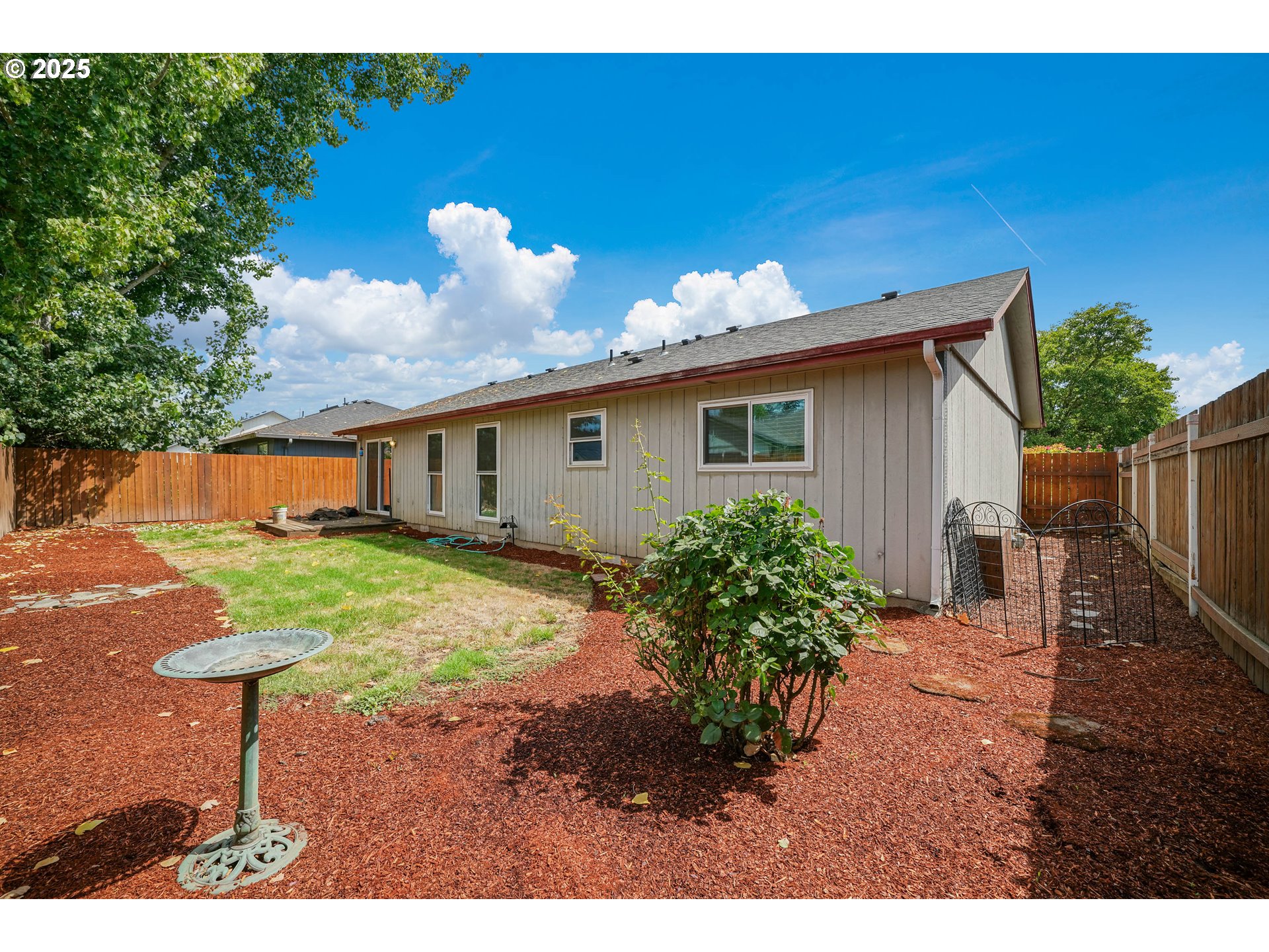 5259 Spring Leaf Court North Keizer, OR 97303 - Photo 30 of 30 a backyard of a house with table and chairs