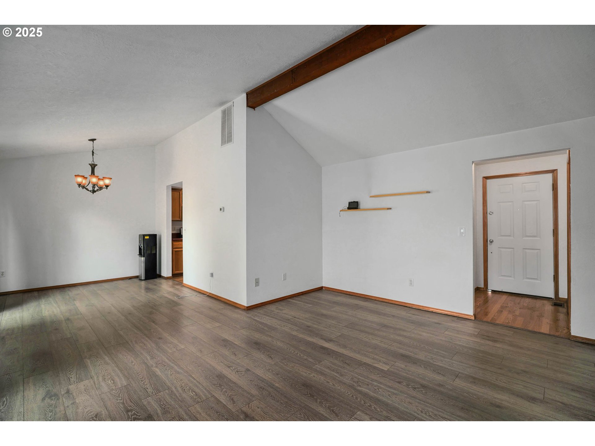 5259 Spring Leaf Court North Keizer, OR 97303 - Photo 6 of 30 a view of an empty room with wooden floor