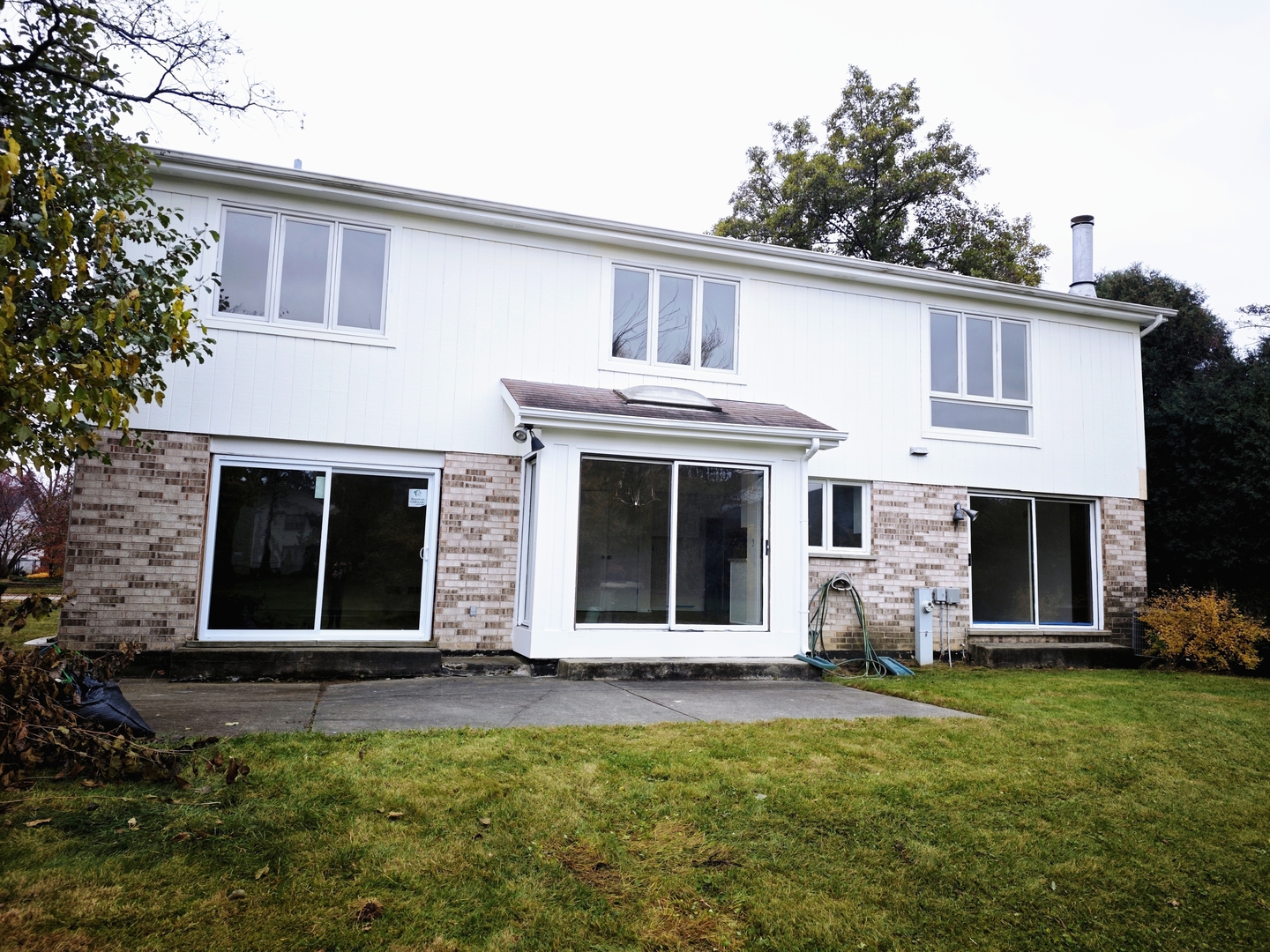 3820 Kiess Drive Glenview, IL 60026 - Photo 37 of 44 a view of a house with a yard and a large window