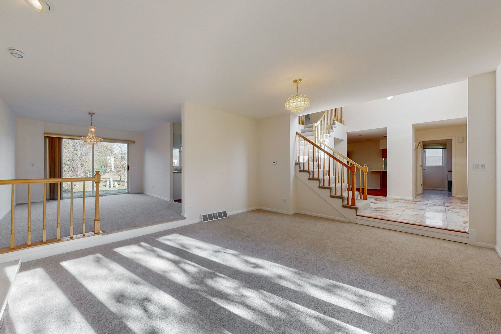 3820 Kiess Drive Glenview, IL 60026 - Photo 4 of 44 a view of a hallway with a bed and windows