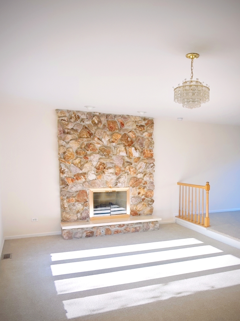 3820 Kiess Drive Glenview, IL 60026 - Photo 6 of 44 a view of fireplace and window