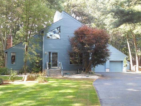 203 Hampton Road Sharon, MA 02067 - Photo 1 of 29 a view of a house with a large tree
