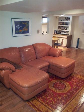 203 Hampton Road Sharon, MA 02067 - Photo 12 of 29 a living room with furniture and kitchen view