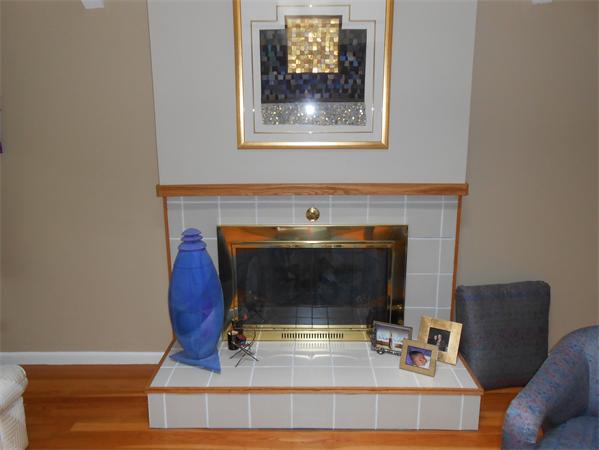 203 Hampton Road Sharon, MA 02067 - Photo 8 of 29 a living room with furniture and a fireplace