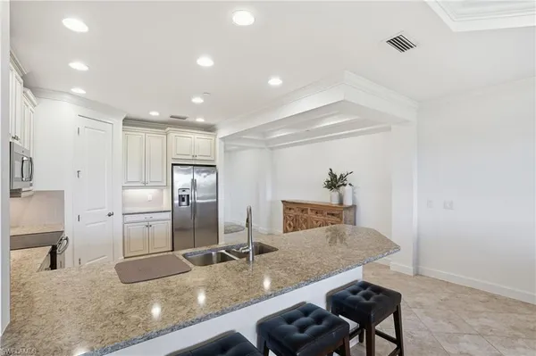 $734,900 | 8773 Bellano Court, Unit 103, Naples, FL 34119