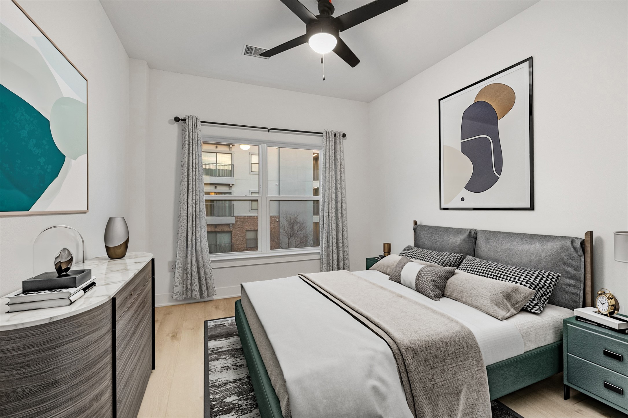 2500 Longview Street, Unit 418 Austin, TX 78705 - Photo 18 of 40 Bedroom featuring light wood-style flooring and ceiling fan