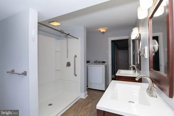 a bathroom with a sink and a bathtub