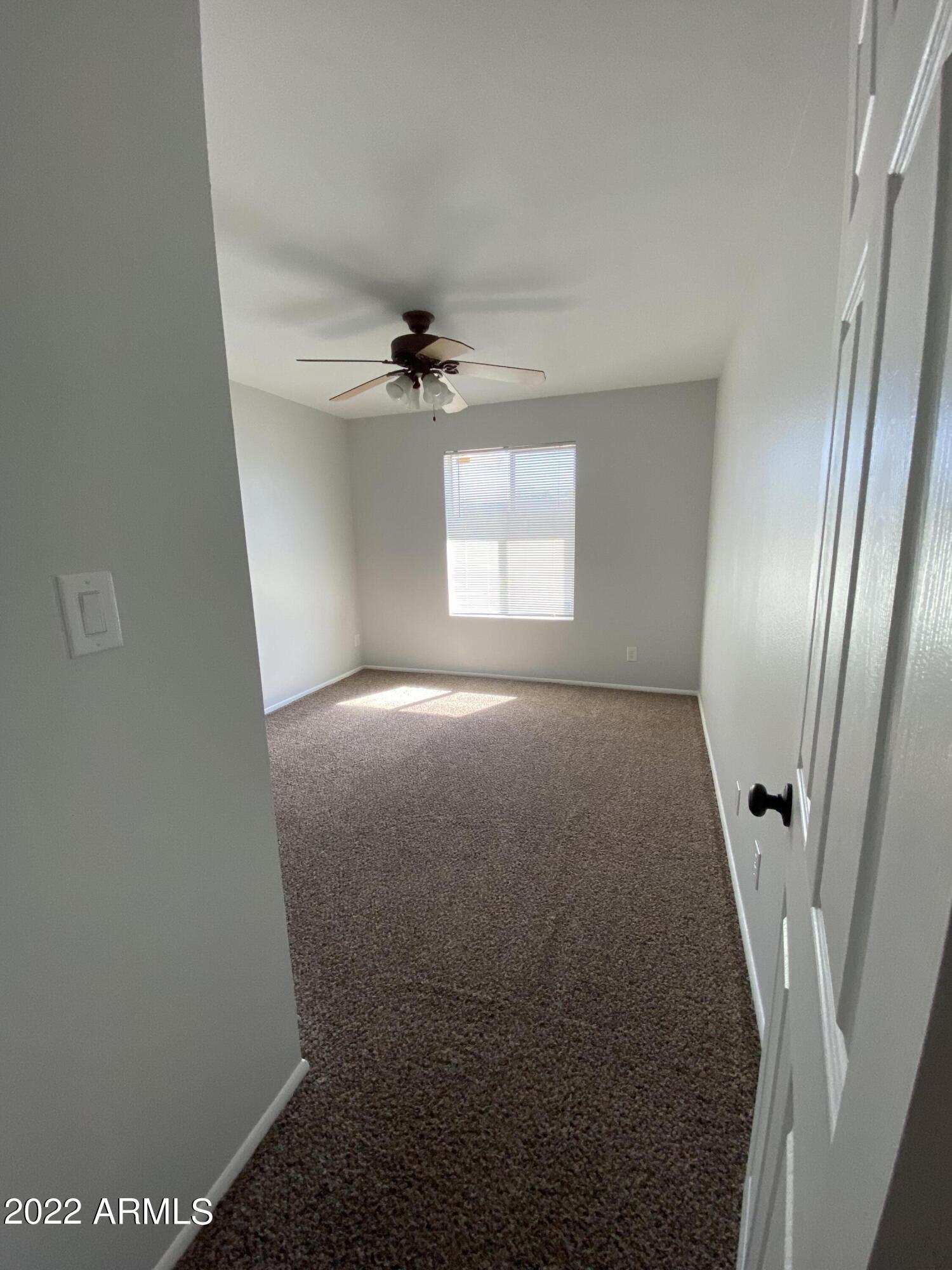 3244 West Yucca Street Phoenix, AZ 85029 - Photo 12 of 21 a view of empty room with windows