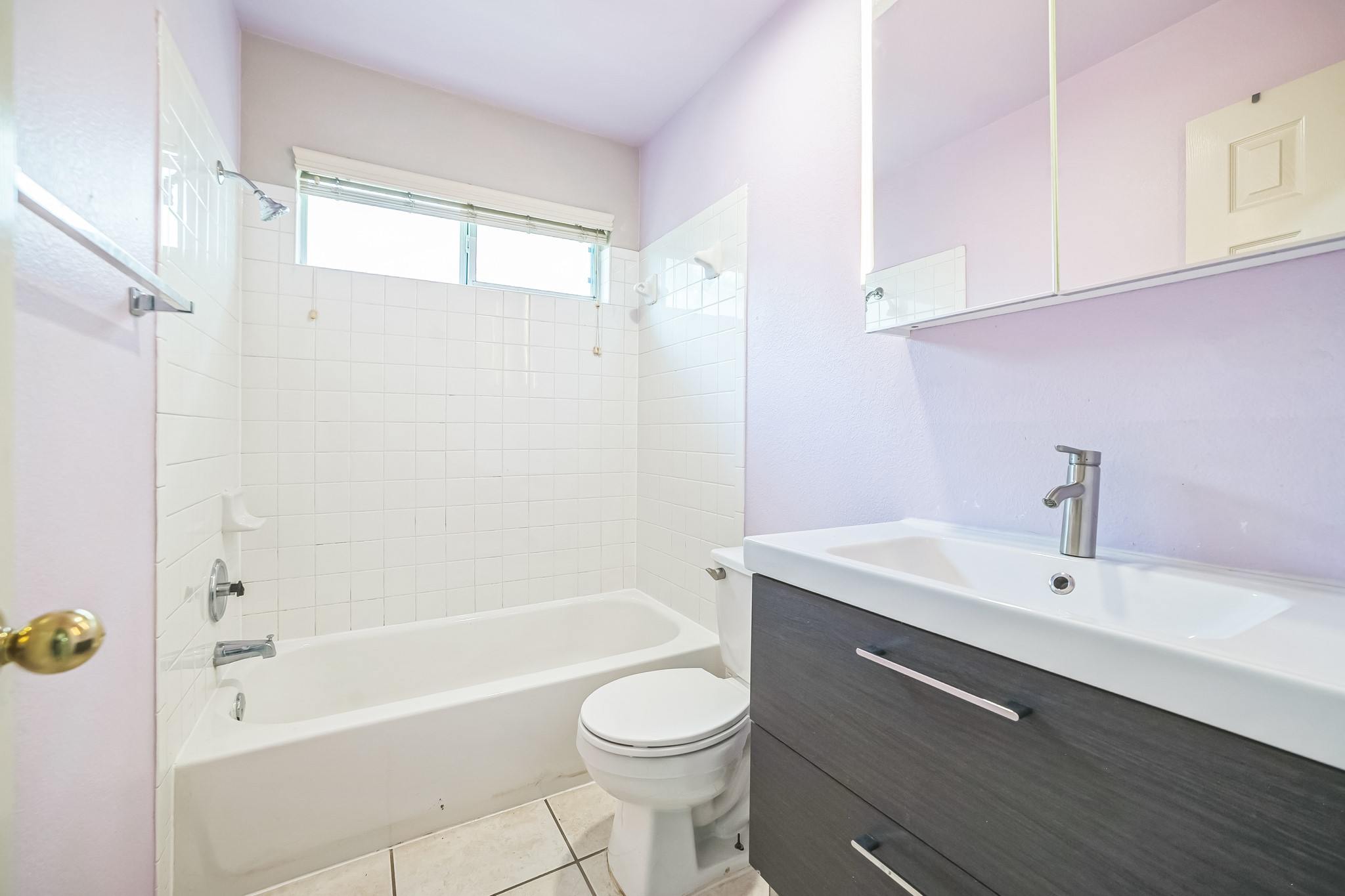3630 Spring Canyon Trail Round Rock, TX 78681 - Photo 15 of 23 Bathroom with vanity, shower / washtub combination, and light tile patterned flooring
