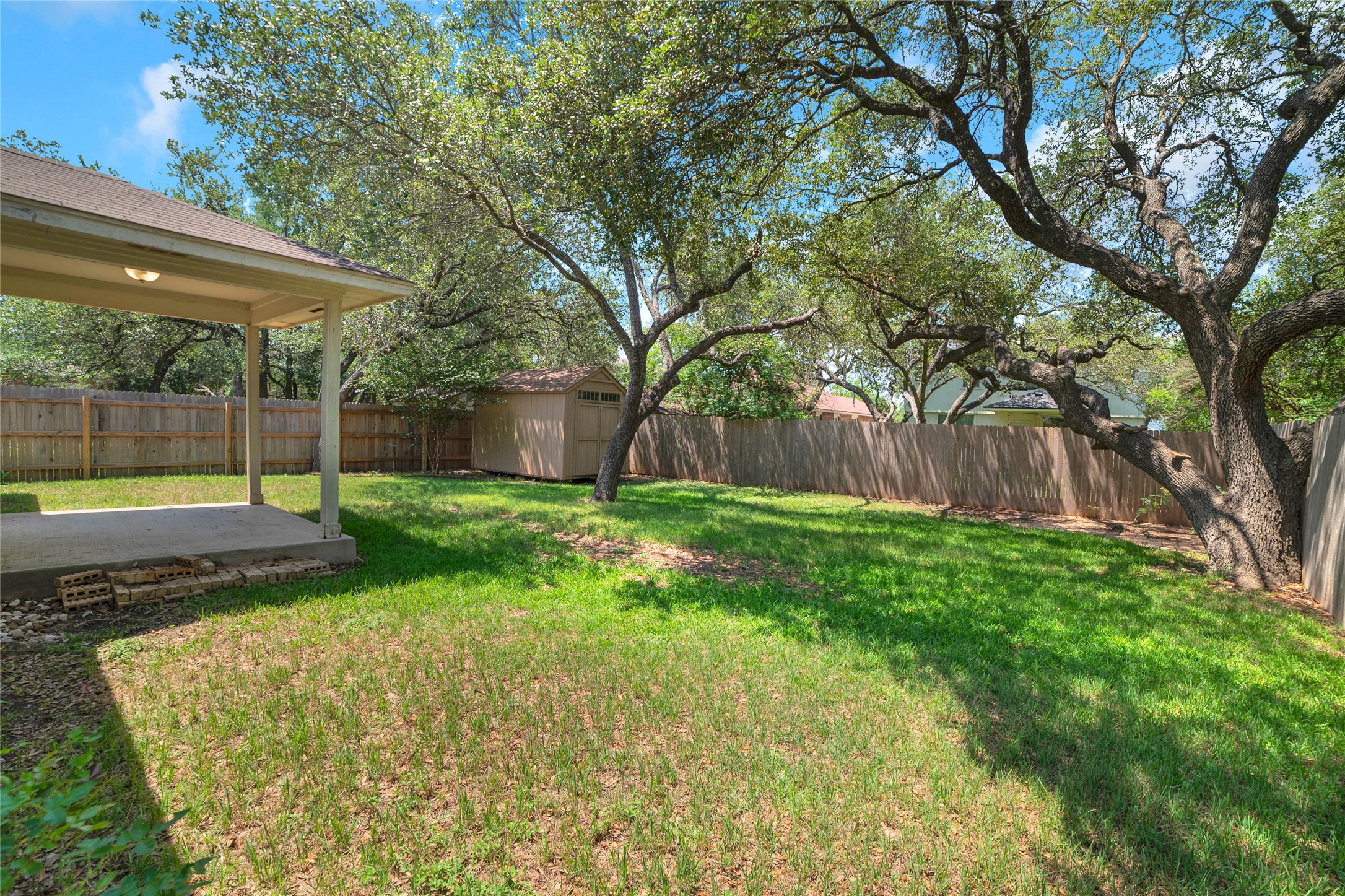3630 Spring Canyon Trail Round Rock, TX 78681 - Photo 19 of 23 Fenced backyard with a shed