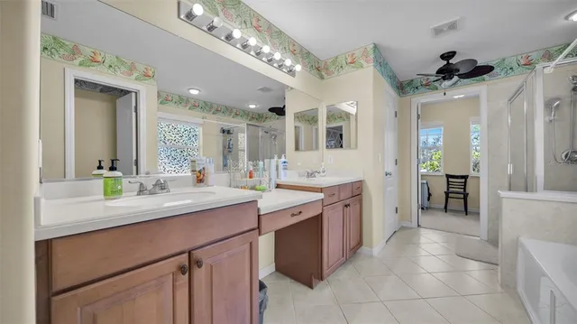 a kitchen with a sink and a refrigerator