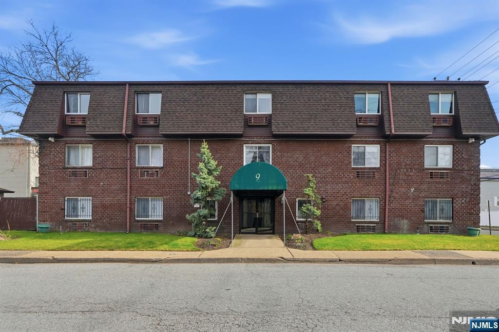 9 Vreeland Street, Unit 2F Hackensack, NJ 07601 - Photo 1 of 20 a view of a building with a yard