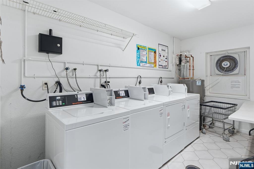 9 Vreeland Street, Unit 2F Hackensack, NJ 07601 - Photo 17 of 20 a view of storage and utility room with two washing machine