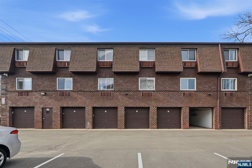 9 Vreeland Street, Unit 2F Hackensack, NJ 07601 - Photo 20 of 20 a tall building with a outdoor space
