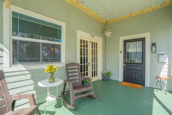a view of outdoor dining space and dining room