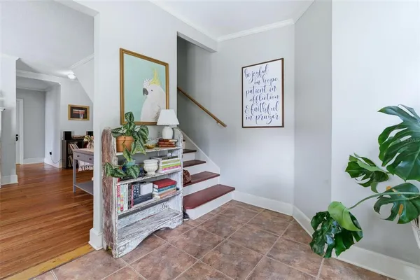 a dining room with furniture window wooden floor