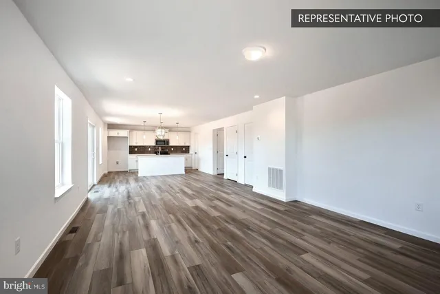 a view of livingroom with hardwood floor and window