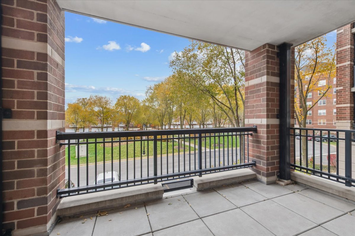 440 West Mahogany Court, Unit 203 Palatine, IL 60067 - Photo 14 of 17 a view of a balcony with staircase