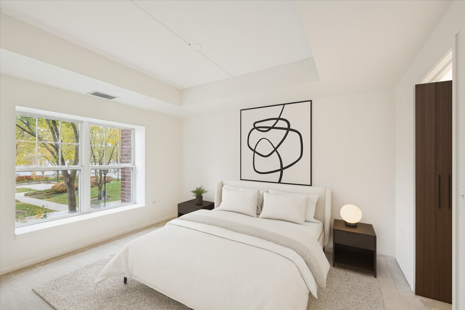 440 West Mahogany Court, Unit 203 Palatine, IL 60067 - Photo 8 of 17 a bedroom with a bed and window