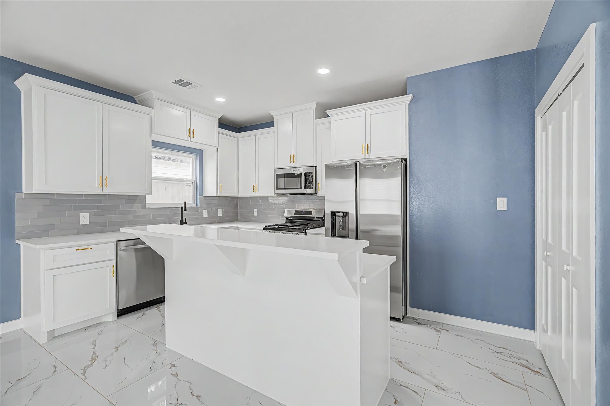 5919 Rietta Street Houston, TX 77016 - Photo 7 of 32 Island in kitchen is the heart of the home.