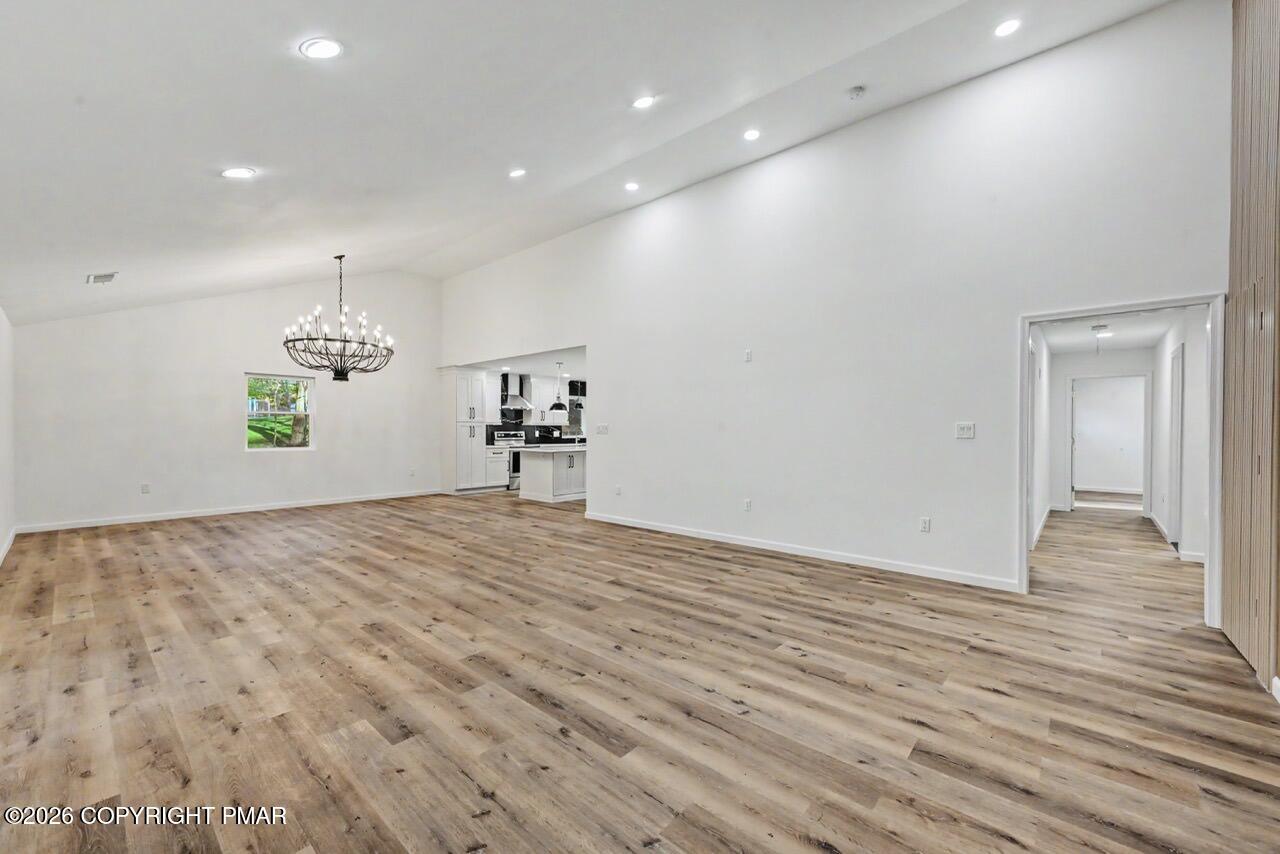 1131 Mink Court Bushkill, PA 18324 - Photo 19 of 81 a view of a livingroom with wooden floor