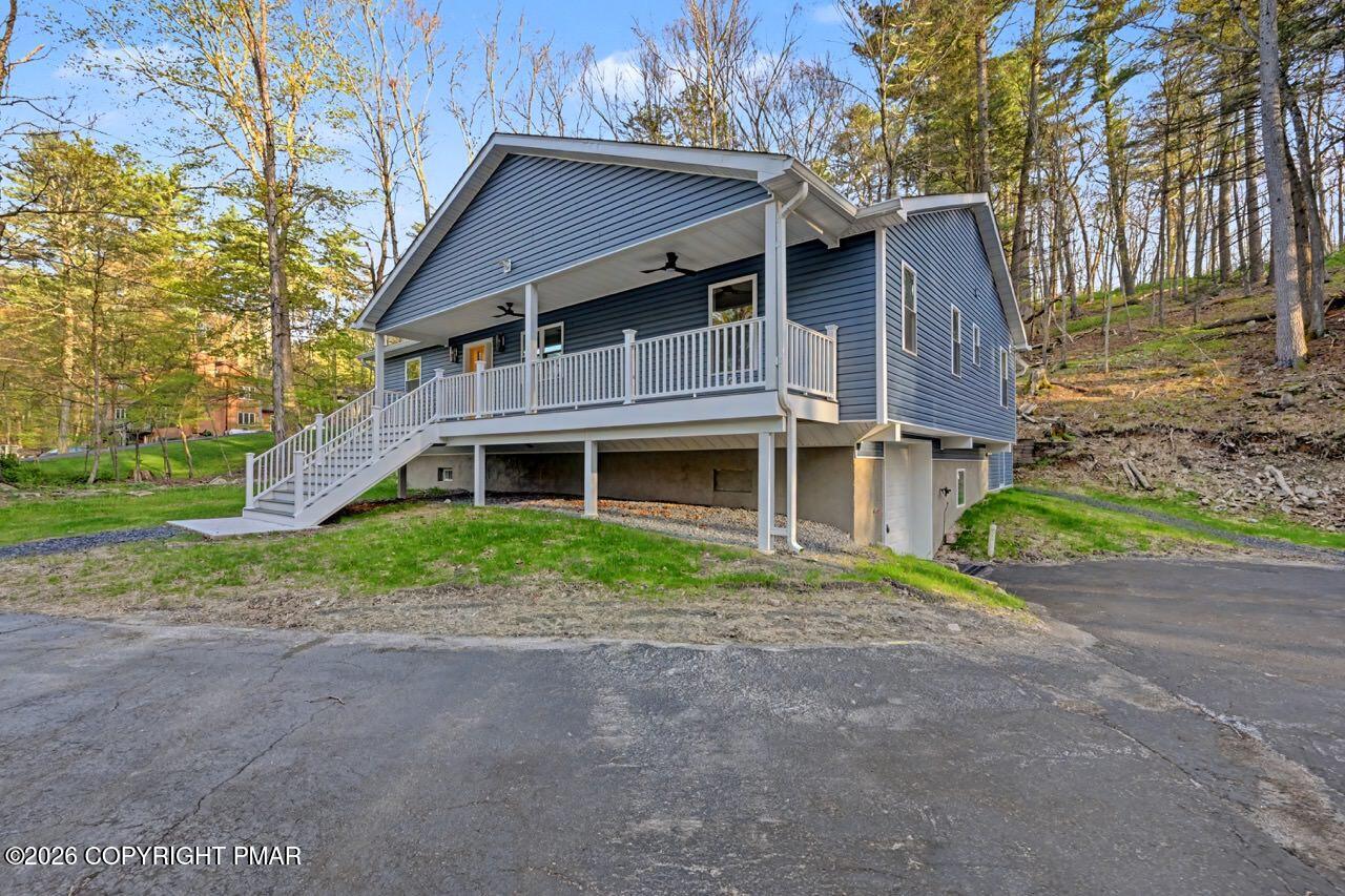 1131 Mink Court Bushkill, PA 18324 - Photo 2 of 81 a view of a house with a yard