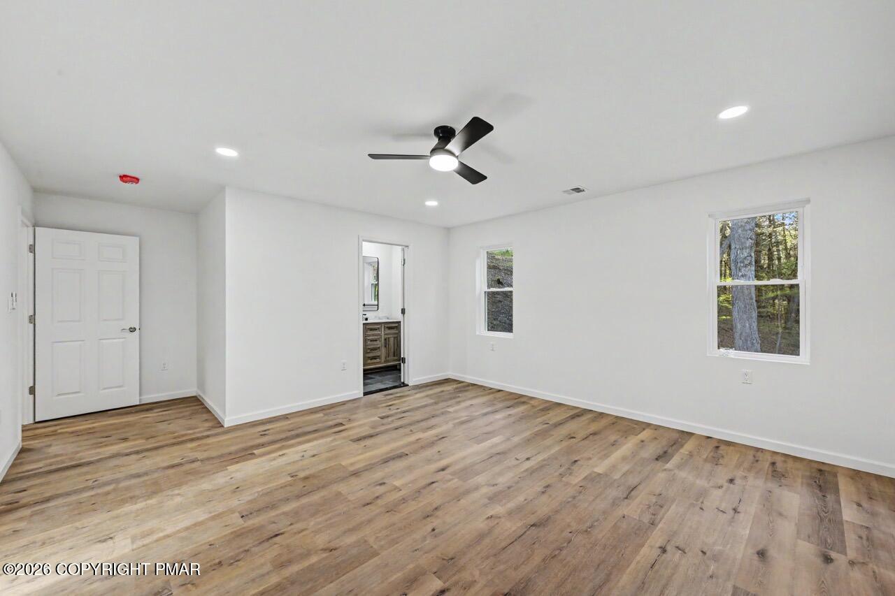 1131 Mink Court Bushkill, PA 18324 - Photo 37 of 81 a view of an empty room with a window