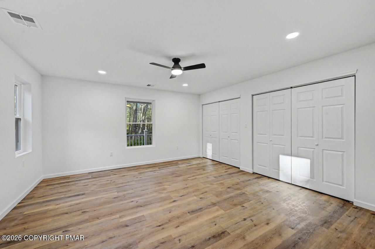 1131 Mink Court Bushkill, PA 18324 - Photo 42 of 81 a view of an empty room with a window