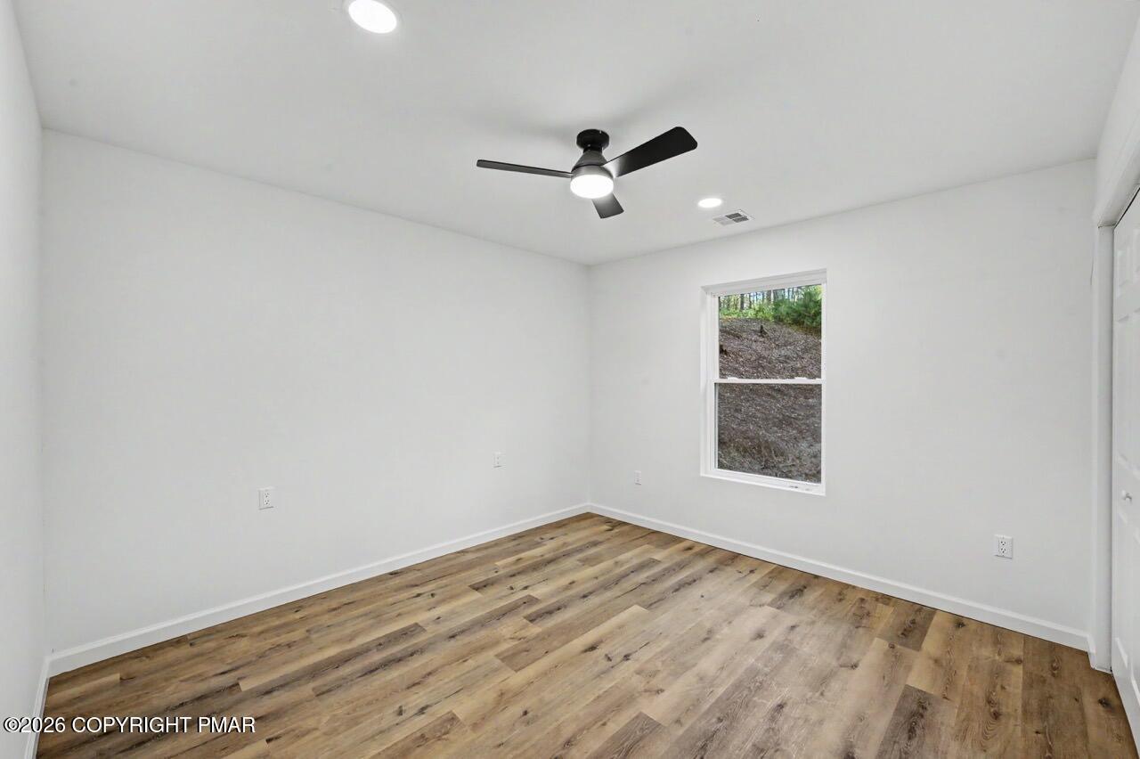 1131 Mink Court Bushkill, PA 18324 - Photo 47 of 81 an empty room with a window
