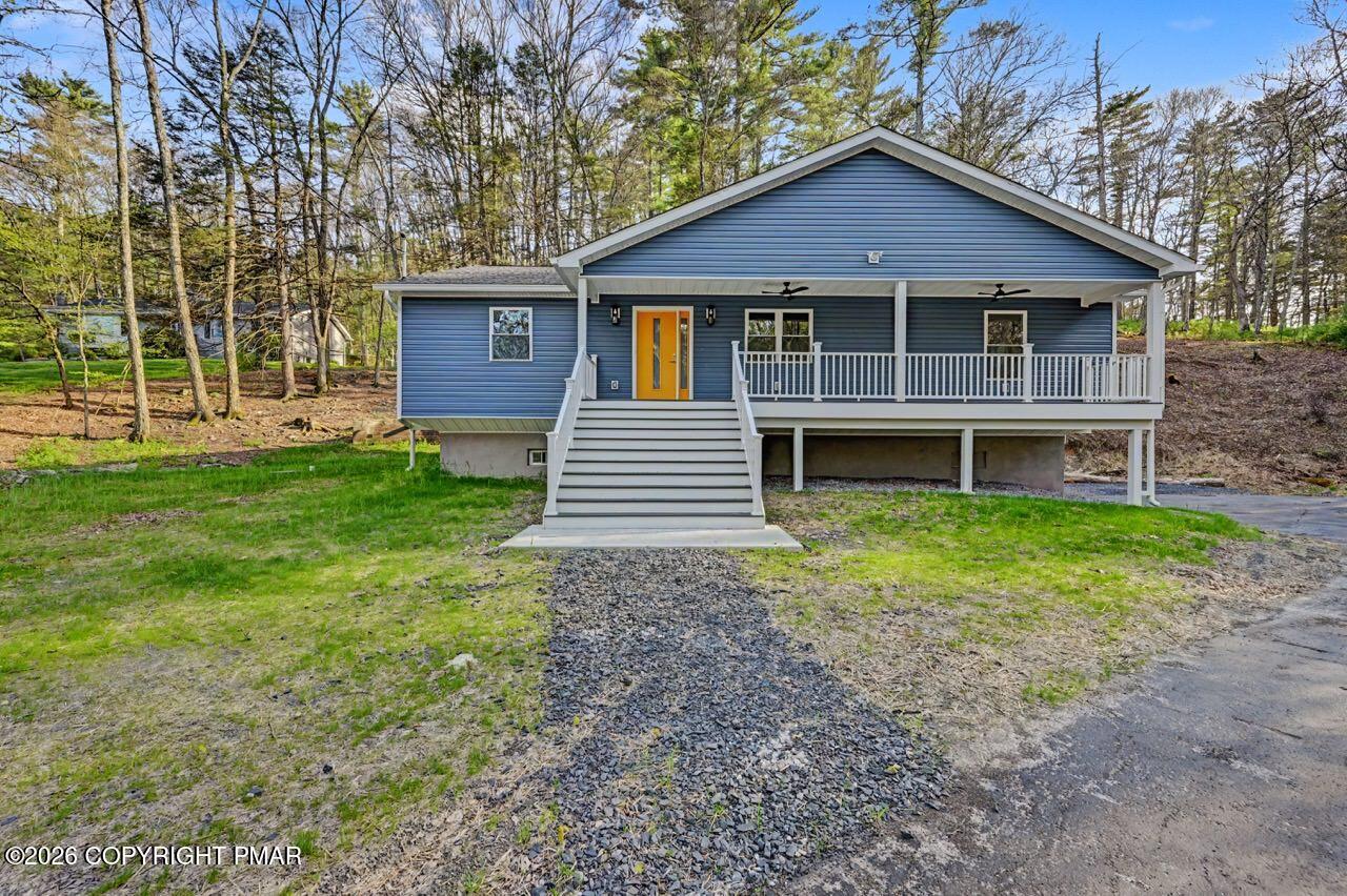 1131 Mink Court Bushkill, PA 18324 - Photo 5 of 81 a front view of a house with a yard