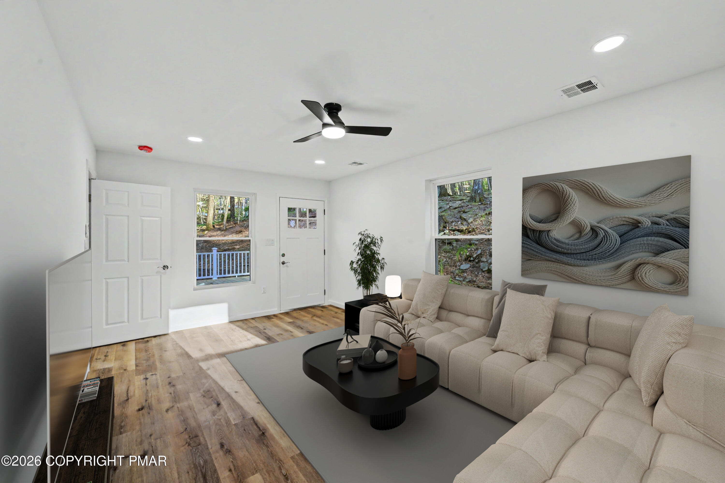 1131 Mink Court Bushkill, PA 18324 - Photo 56 of 81 a living room with furniture and a potted plant