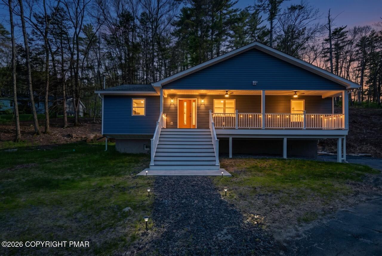 1131 Mink Court Bushkill, PA 18324 - Photo 6 of 81 a front view of a house with a yard