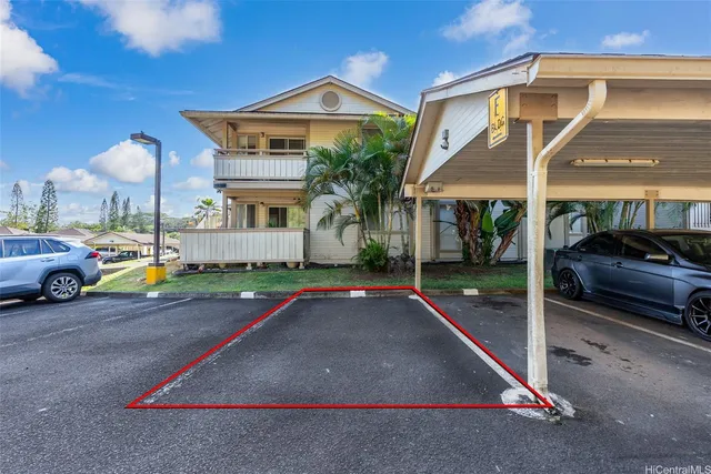 a car parked in front of a building