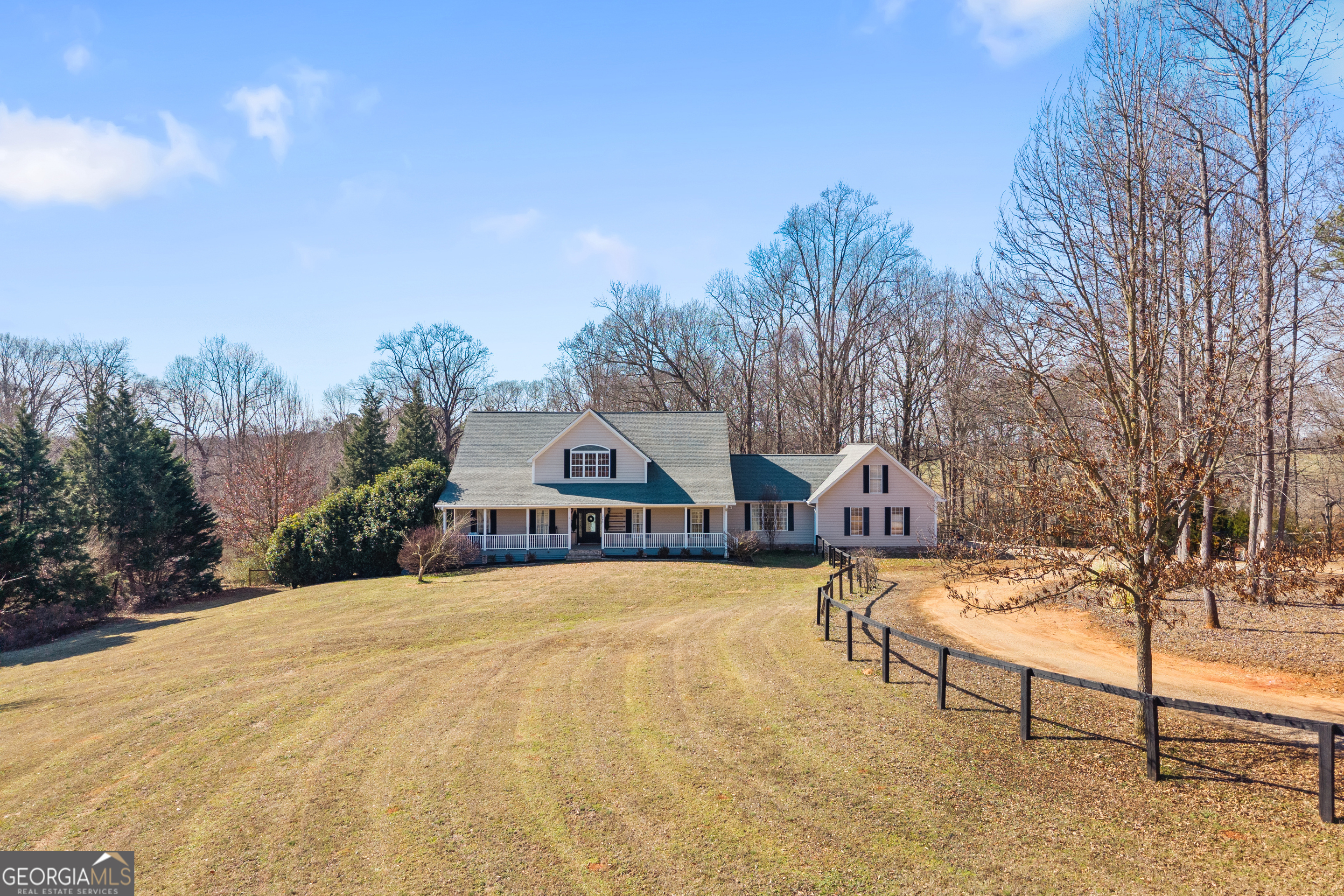 2565 New Franklin Church Road Canon, GA 30520 - Photo 2 of 168 a view of a house with snow on the road