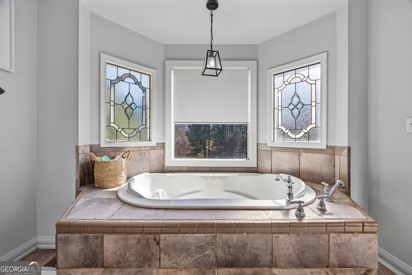 a kitchen with stainless steel appliances granite countertop a stove and a sink