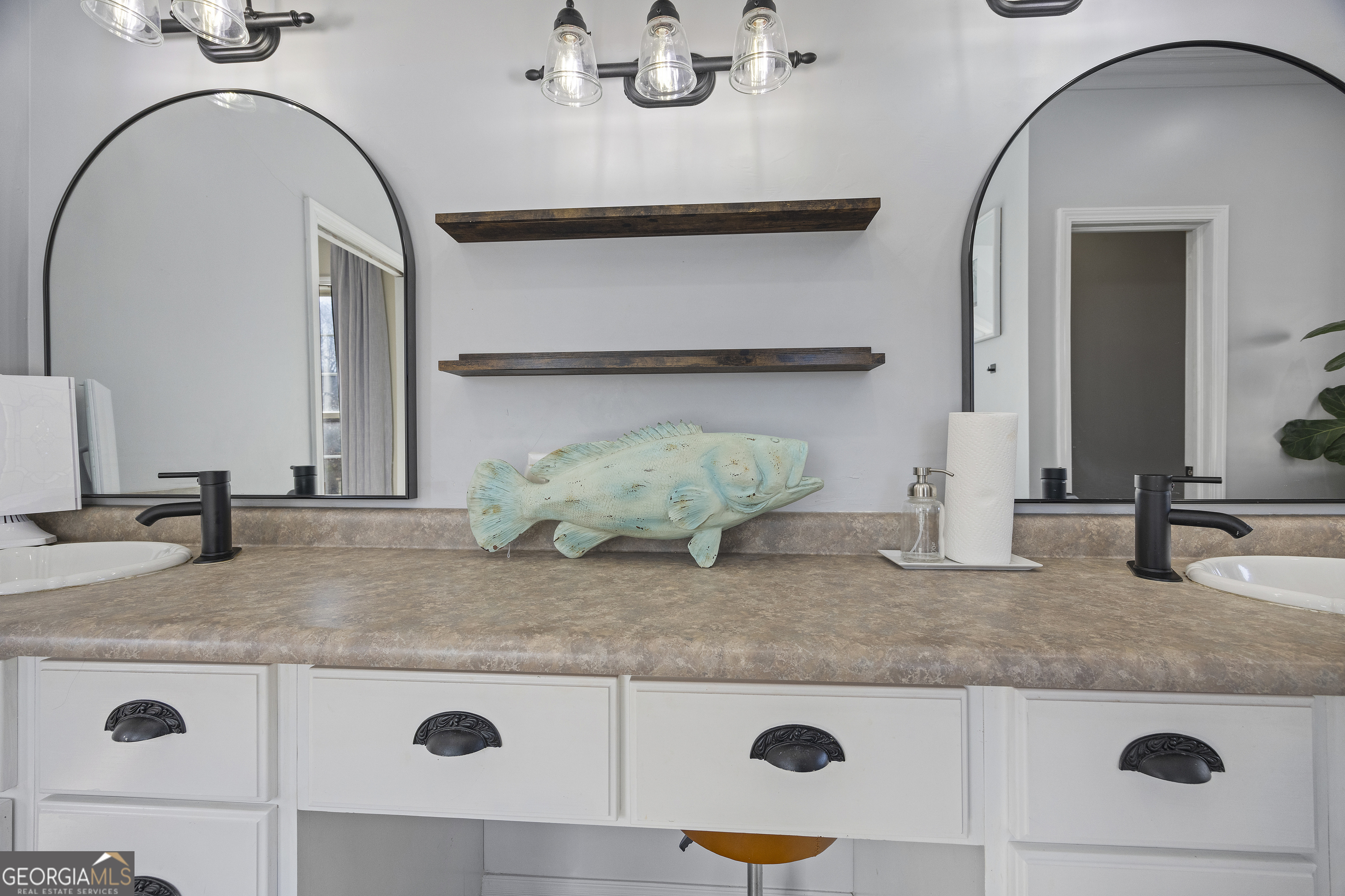 2565 New Franklin Church Road Canon, GA 30520 - Photo 26 of 168 a bathroom with a granite countertop sink and a mirror