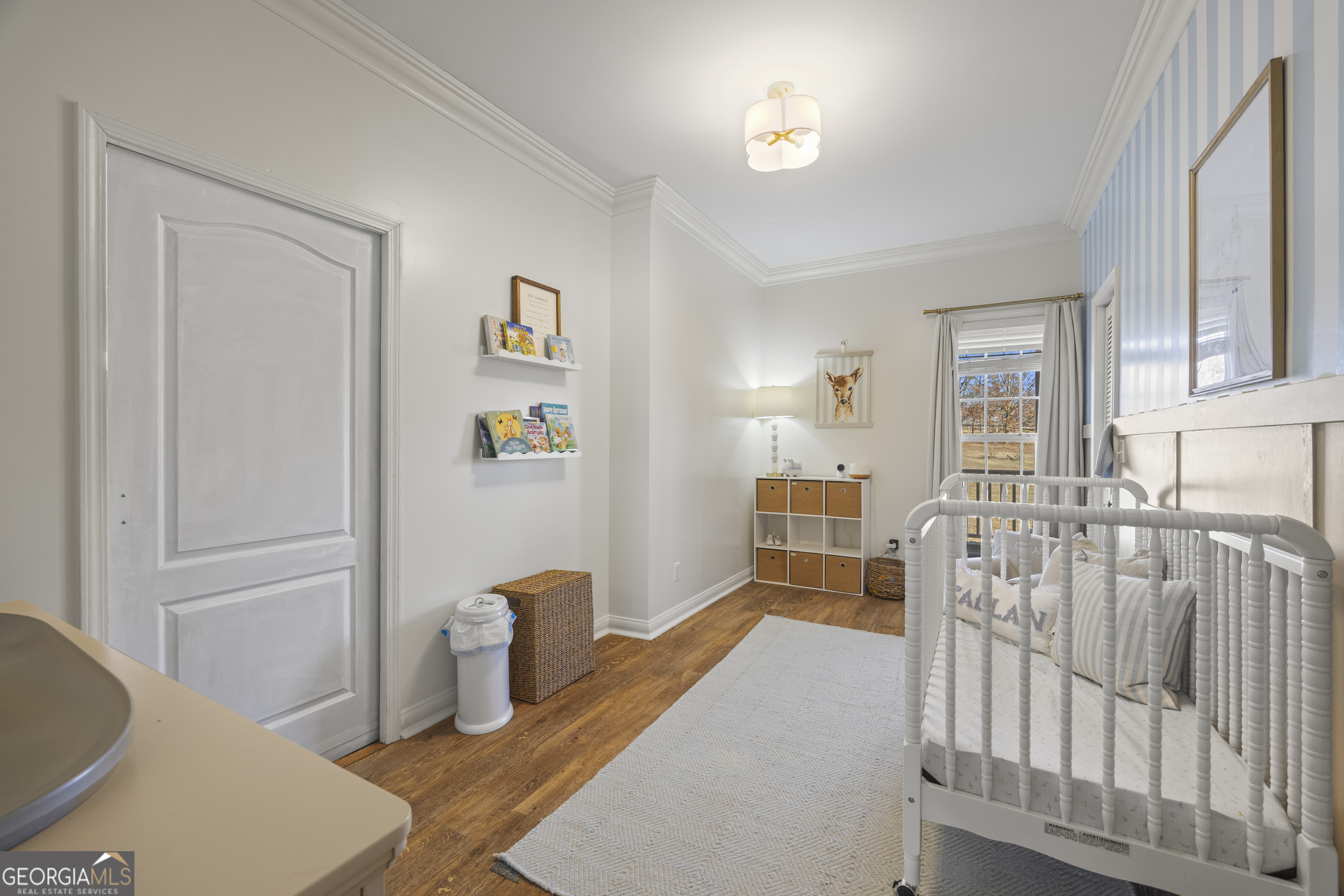 2565 New Franklin Church Road Canon, GA 30520 - Photo 31 of 168 a bedroom with furniture and wooden floor