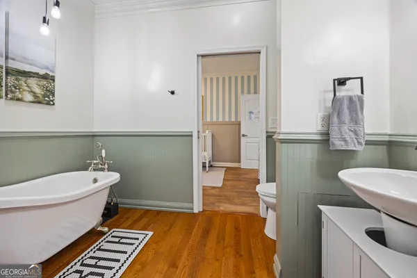 a kitchen with stainless steel appliances a refrigerator and a stove top oven