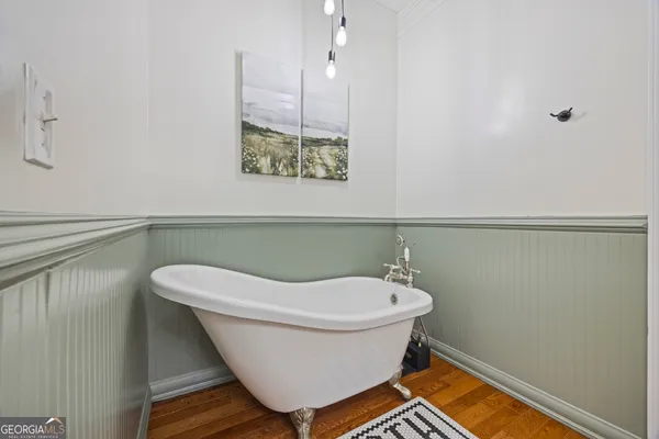 a view of a porch with wooden floor and outdoor space