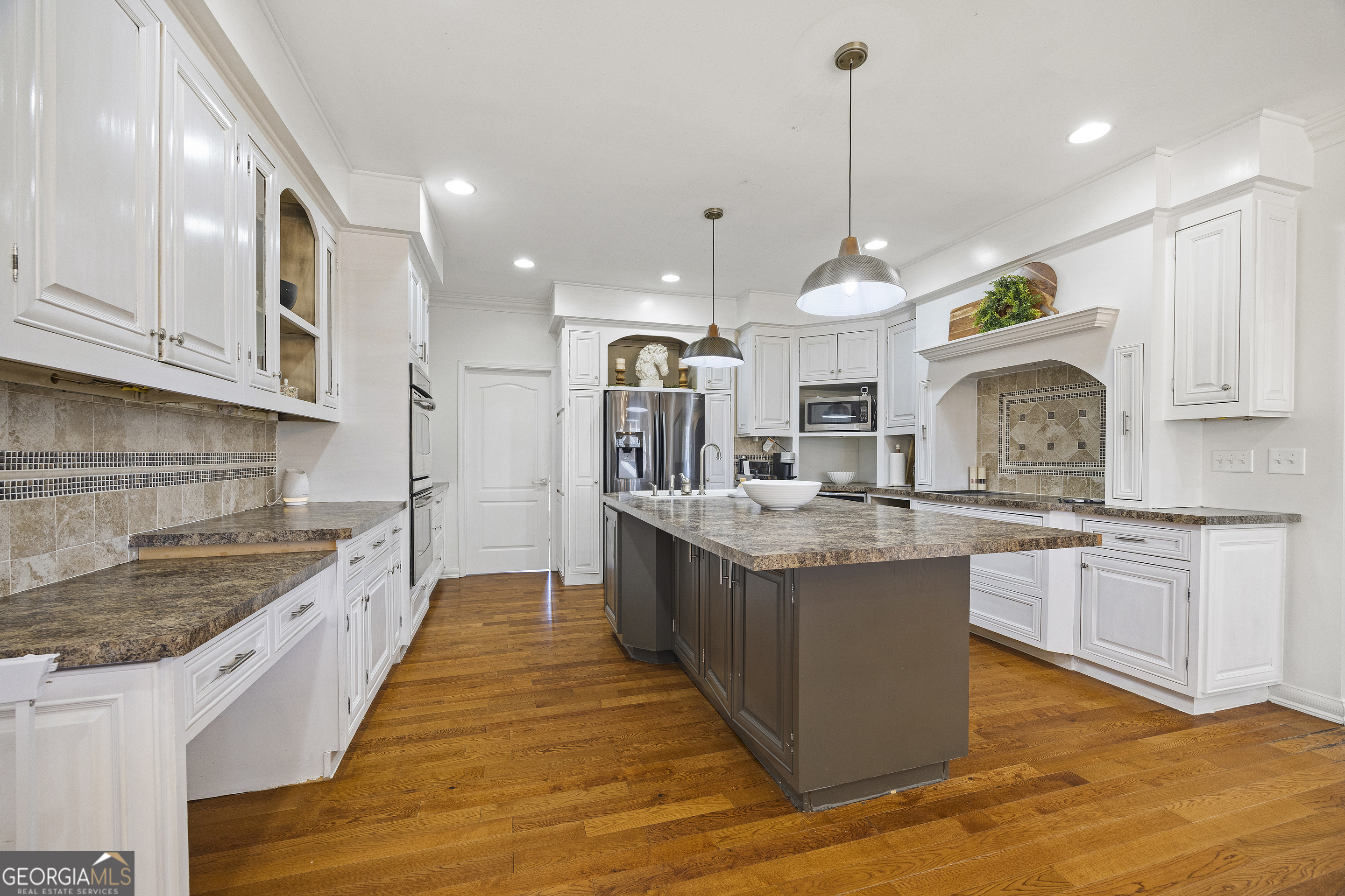 2565 New Franklin Church Road Canon, GA 30520 - Photo 43 of 168 a large kitchen with granite countertop a large center island a sink stainless steel appliances and cabinets