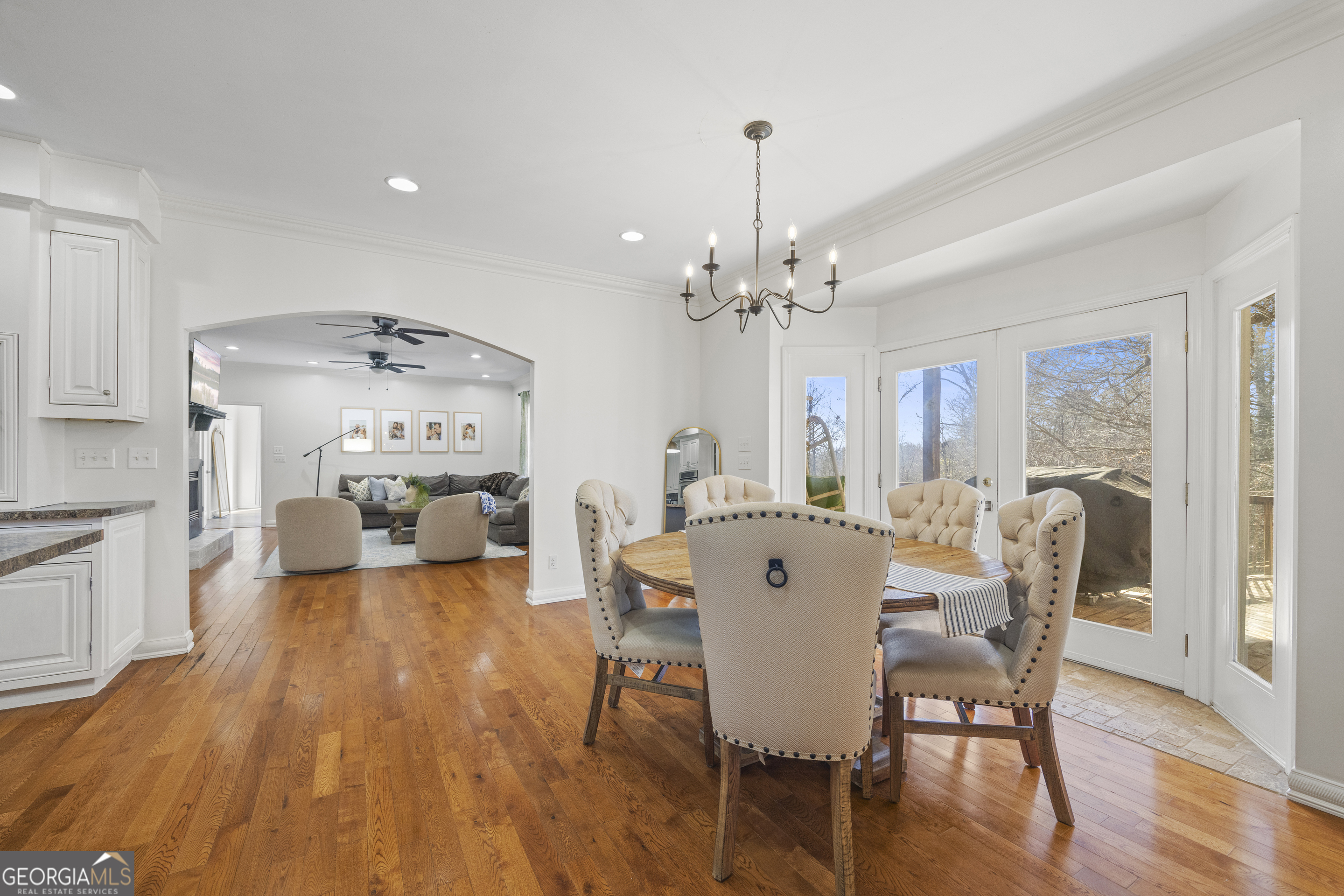 2565 New Franklin Church Road Canon, GA 30520 - Photo 44 of 168 a view of a dining room with furniture a chandelier and wooden floor