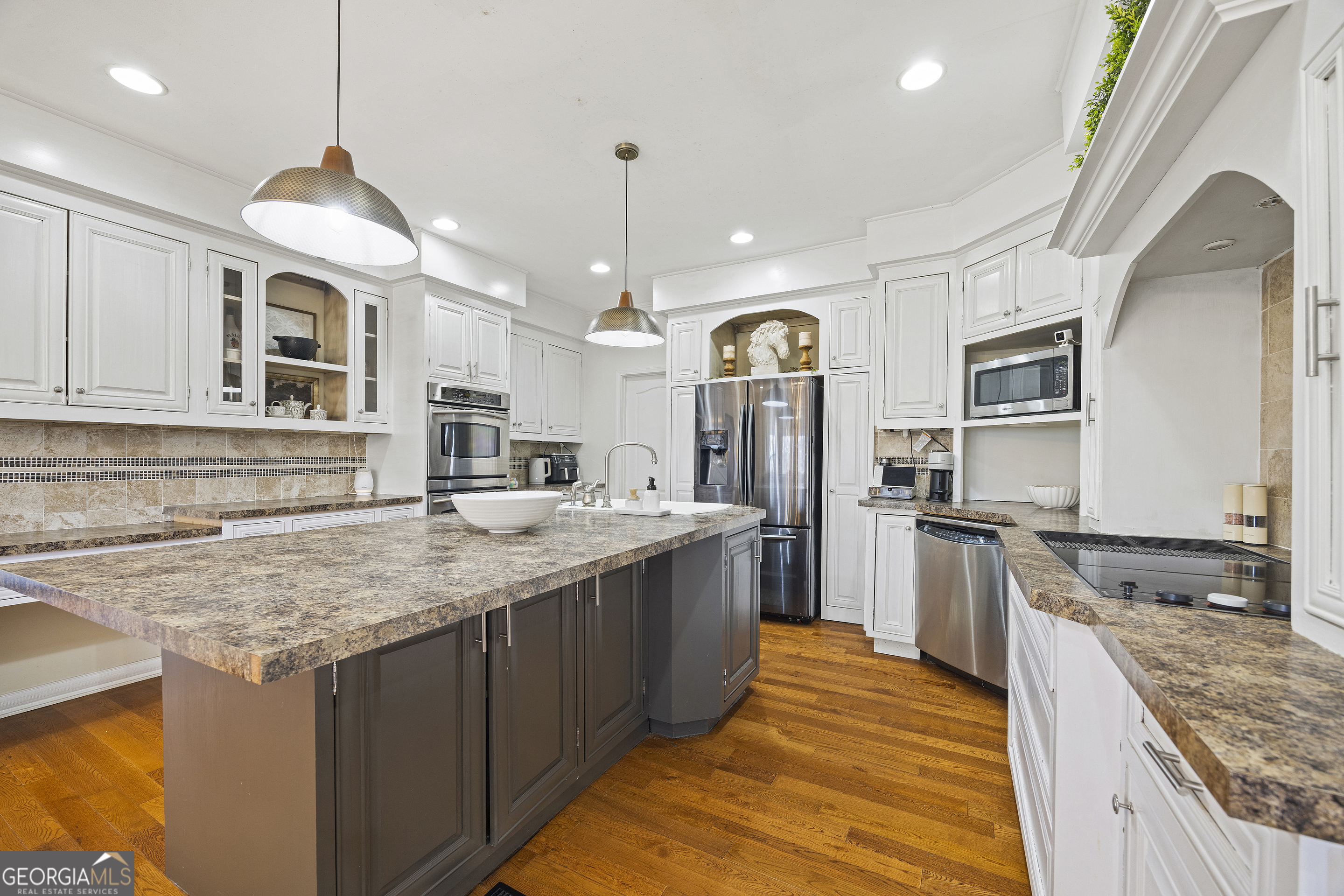 2565 New Franklin Church Road Canon, GA 30520 - Photo 47 of 168 a kitchen with stainless steel appliances granite countertop a sink stove and refrigerator
